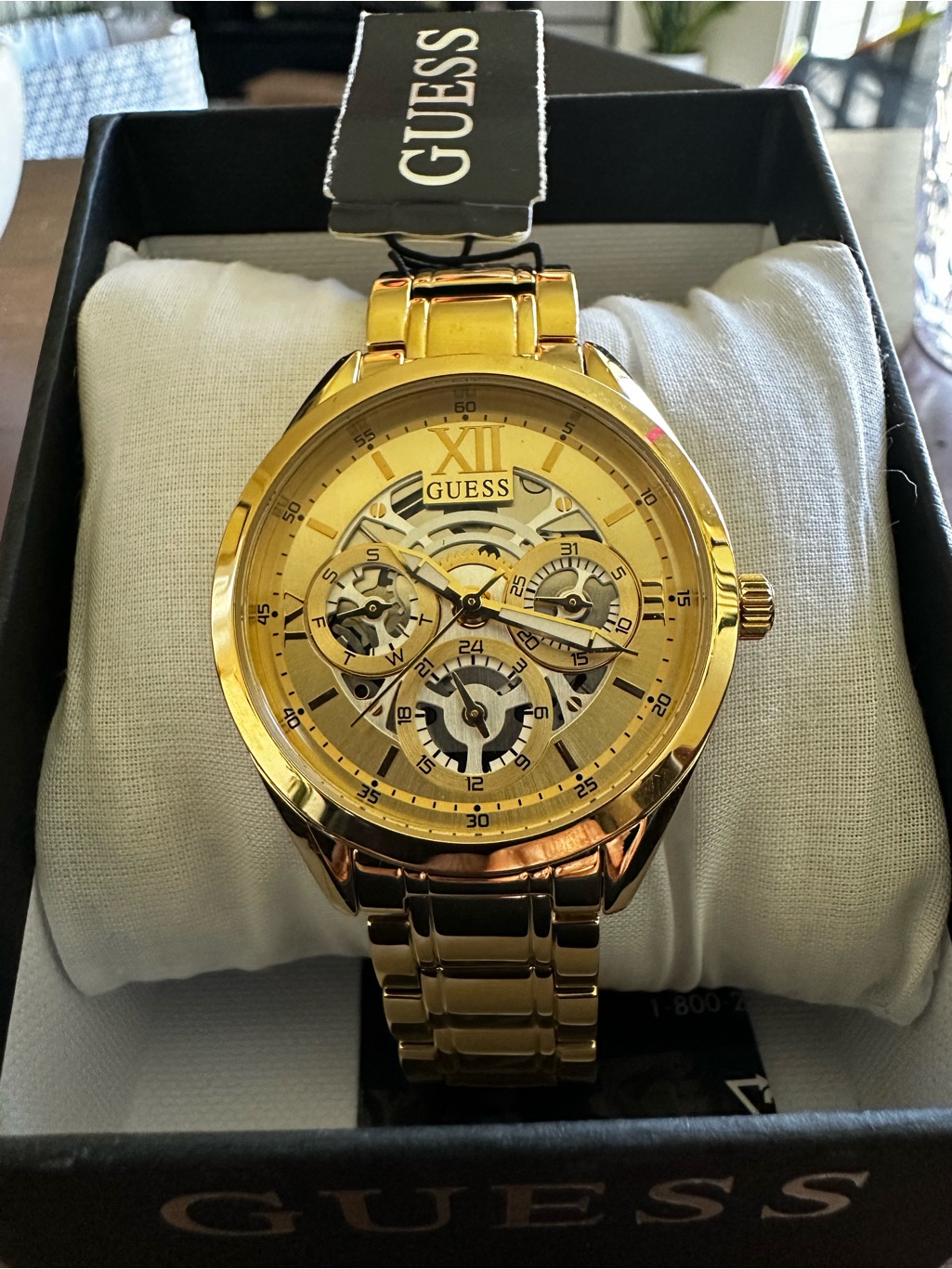Guess Gold Tone Women’s Skeleton Dial Bracelet Watch
